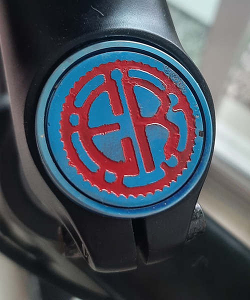 Titanium and 24K gold Monogram