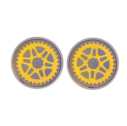 Pair of handlebar end cap with gold chain ring design on a white background