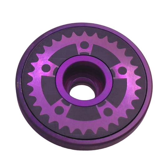 Chain ring design purple titanium Stem top cap on a white background