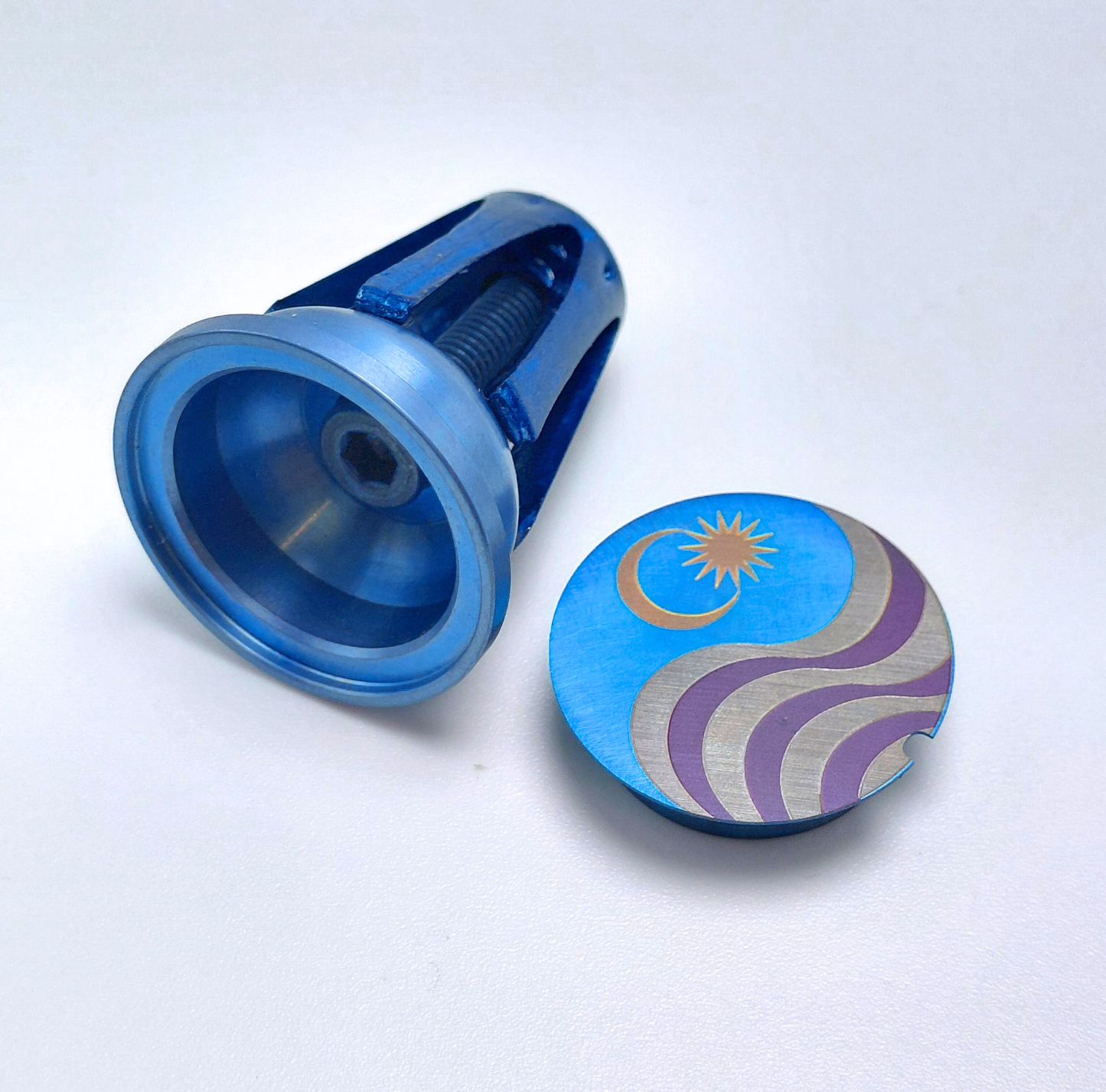 Mybikemonogram.com blue anodized Titanium with flag design on a light blue background