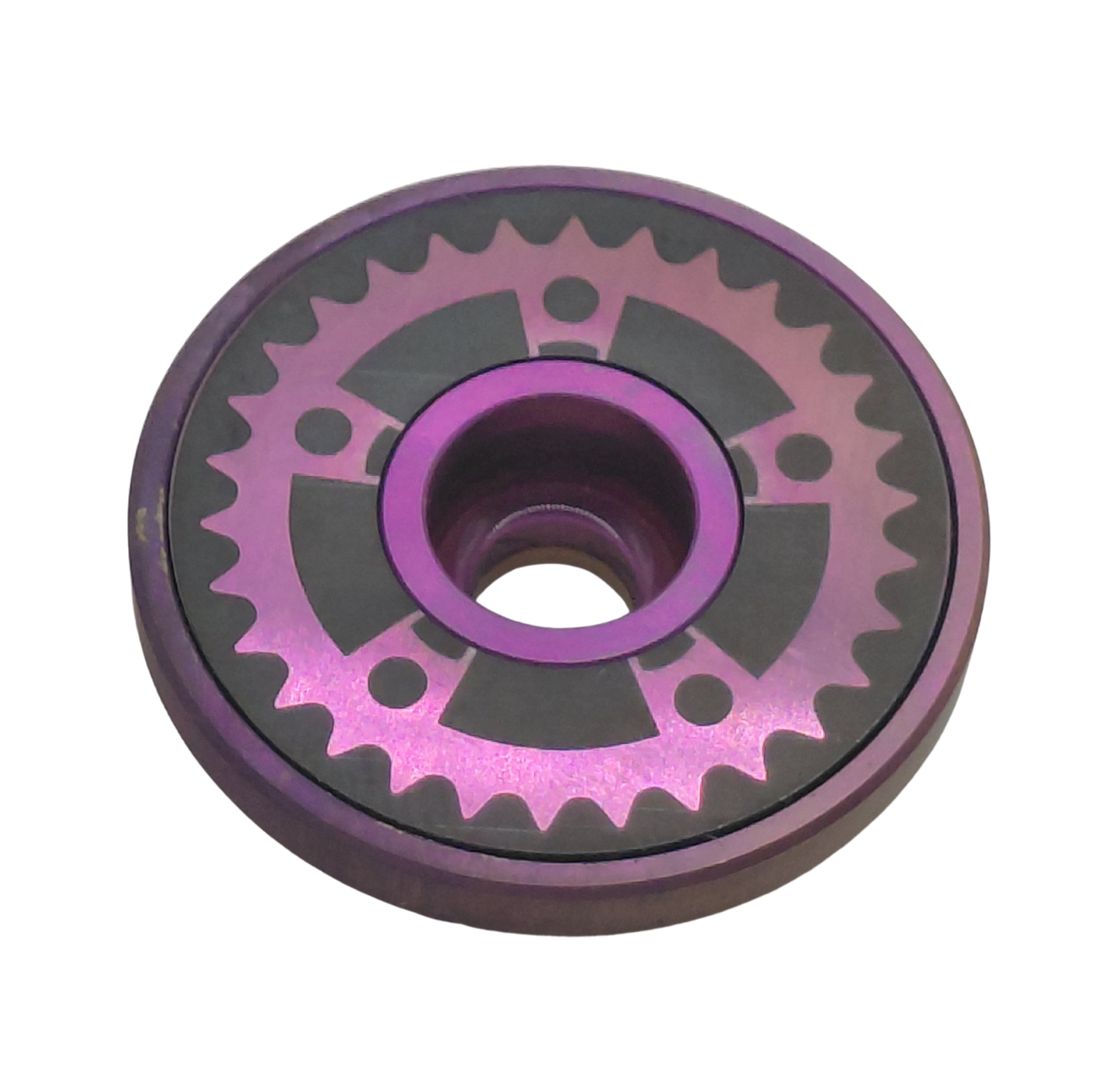 Chain ring design, purple titanium Stem top cap on a white background