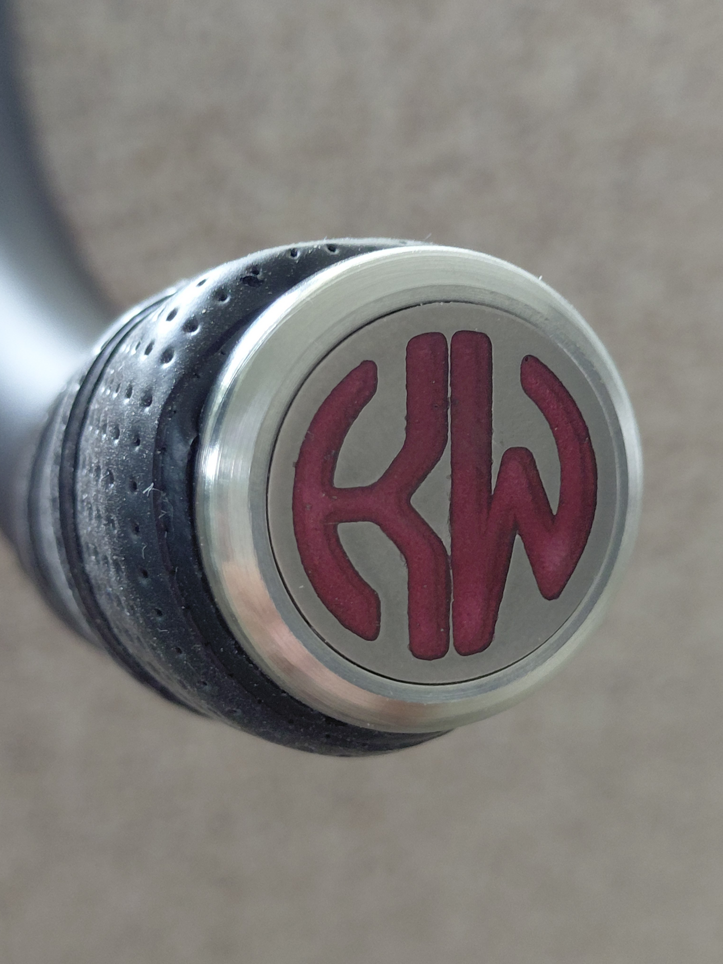 Titanium and 24K gold Monogram